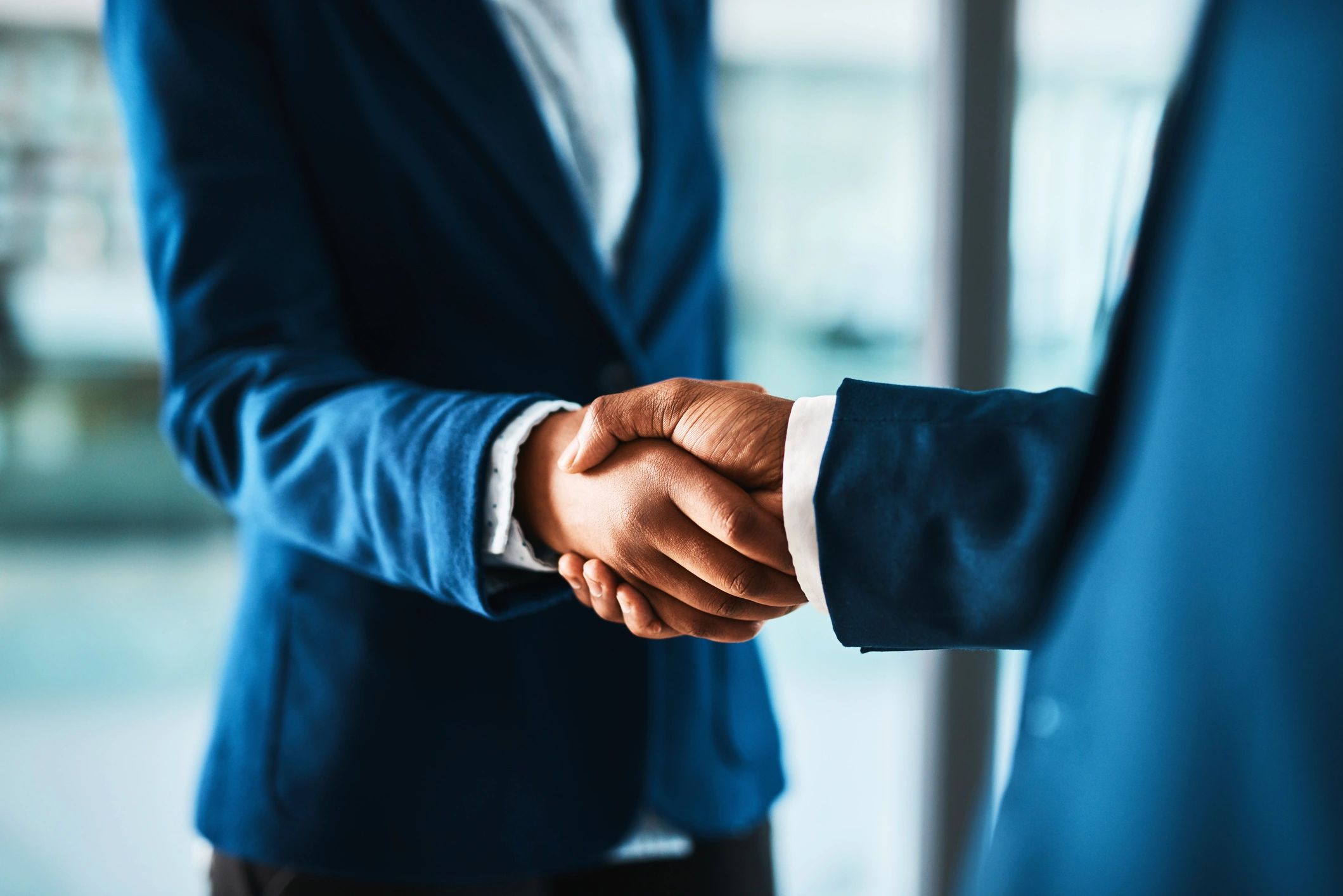 business handshake global partnership